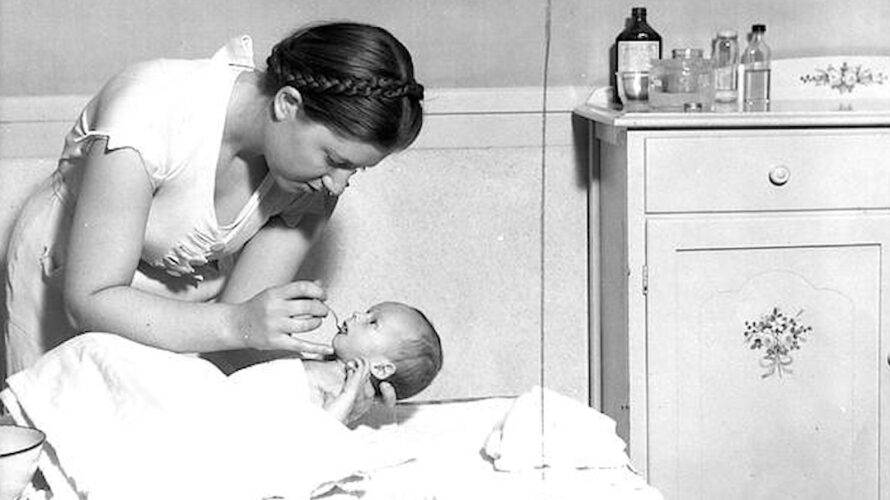 Student caring for practice baby at Cornell University